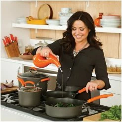 Rachael Ray Hard Anodized II Cookware Set W/ Orange Handles: 10pc -Cookware Sets Sales 2023 rachael ray evoo bottles in use kitchen setting compressed 6 1