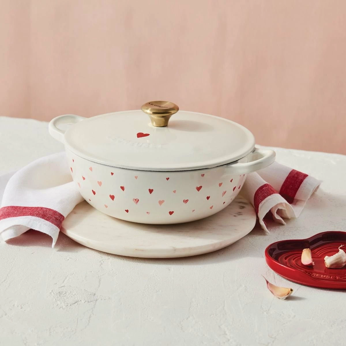 Le Creuset L'Amour 2.75 Qt. Enameled Cast Iron Soup Pot With Gold Knob & Heart Applique | White 5 Le Creuset L'Amour 2.75 Qt. Enameled Cast Iron Soup Pot With Gold Knob & Heart Applique | White - Image 5