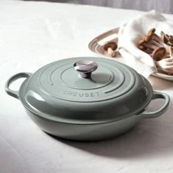 Le Creuset 3.5 Qt. Signature Enameled Cast Iron Braiser With Stainless Steel Knob | Sea Salt -Cookware Sets Sales 2023 rs9177 spring 2019 meringueseasalt 0173 lpr