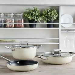 SMEG 4 Qt. Nonstick Deep Pan With Lid | Cream 10 SMEG 4 Qt. Nonstick Deep Pan With Lid | Cream -Cookware Sets Sales 2023 smeg cookware cream 1